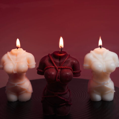 Low temperature BDSM candle shaped like female torso
